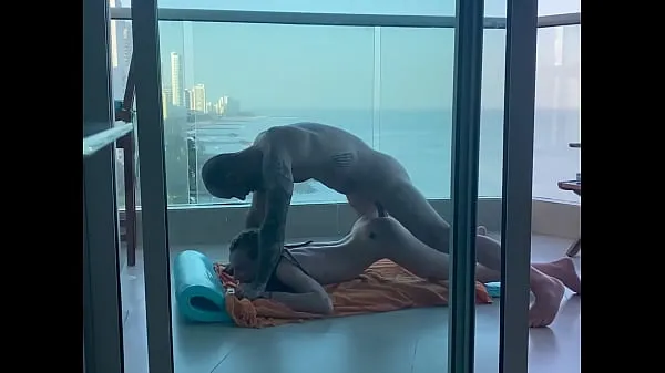 On a balcony in Cartagena, a young student gets her pretty little ass filled Video mới mới